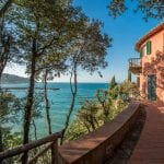 Porto Santo Stefano villa overlooking the sea with private beach and garden. This prestige villa for sale has 10 ensuite bedrooms and superb panoramic sea views. 800 sqm – 8,608 sqft on a 5,000 sqm plot.