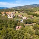 View of unique modern Tuscan villa and surroundings