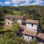 Countryside setting of farmhouse and converted barn in Umbria for sale