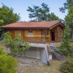 Exterior view of Tuscan chalet for sale