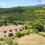 Aerial view of Tuscan farmhouse for sale and surroundings