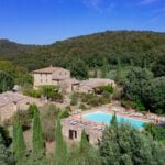 View of Tuscan hamlet for sale with 3 farmhouses