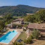 View of Umbria Farmhouse (divided into 3 apartments) with garden and pool, guest apartment plus barn suitable for conversion