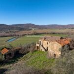 View of Italian farmhouse home and surroundings