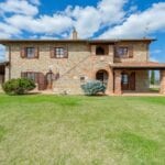 View of recently built Tuscan farmhouse style home