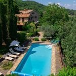 View of pool and villa Cita di Castello Umbria Italy