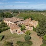 View of Tuscan monastery and apartments for sale.