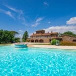 External view of pool and luxury villa home Lucignano Tuscany Italy