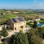 External view showing Marche Italy villa and annexe and pool and surroundings.