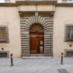 External view of historic Arezzo Tuscany building with studio apartment