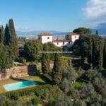 View of Tuscan estate near Florence taking in the Villa, pool and surroundings