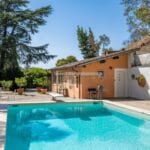 View of pool and Bungalow style villa, Todi Perugia Umbria Italy