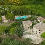 External view of hamlet with buildings, pool and garden for sale near Umbertide Umbria Italy