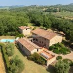 View of RESTORED COUNTRY HOUSE WITH VINEYARDS AND PRIVATE LAKE FOR SALE IN TUSCANY near Bucine
