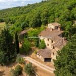 Aerial view of large farmouse, outbuildings and land for sale Greve in Chianti Tuscany Italy