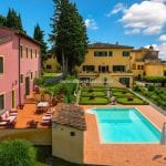 View of mansion, pool and one of the residential buildings Casciana Terme Pisa Tuscany Italy.