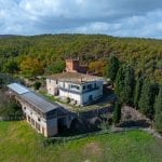 Aerial view of buildings and surroundings, farm estate for sale Trequanda Siena Tuscany Italy