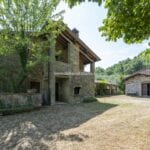 View of farmhouse and converted barn for sale near Città di Castello Umbria Italy