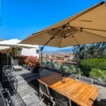 View of terrace and over the historic city centre of Florence from prestige home for sale in Tuscany Italy