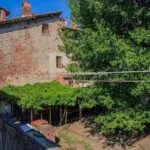 Side view of Tuscan fixer upper