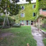 View of exterior and garden of Tuscan townhouse in Sansepolcro