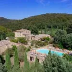 View of Tuscan hamlet for sale with 3 farmhouses
