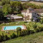 View of historic mill now converted to make a boutique hotel in Tuscany