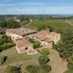 View of Tuscan monastery and apartments for sale.
