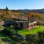 External view of an energy efficient farmhouse home in Tuscany.