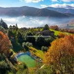 View of bio lake and land at Umbria farm estate for sale