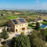 External view showing Marche Italy villa and annexe and pool and surroundings.