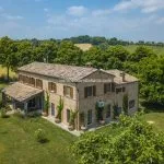 External view of lovely Marche Italy country home and gardens.