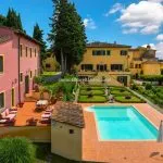 View of mansion, pool and one of the residential buildings Casciana Terme Pisa Tuscany Italy.