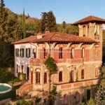 View of Liberty style villa, pool and gardens Loro Ciuffenna Arezzo Tuscany Italy