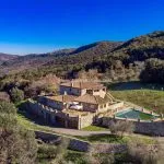 View of Villa with pool, gardens and olive grove Castiglione d’Orcia Tuscany Italy