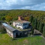 Aerial view of buildings and surroundings, farm estate for sale Trequanda Siena Tuscany Italy