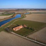 Caorle Veneto Agriturismo with annexes and surrounding farmland for sale. River side property near to the sea. Potential for expansion.