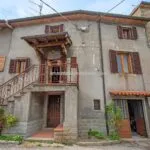 External view of fixer upper home in Tuscany