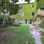 View of exterior and garden of Tuscan townhouse in Sansepolcro
