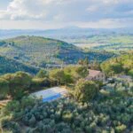 View of farrmhouse and pool for sale in Umbria