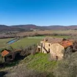 View of Italian farmhouse home and surroundings