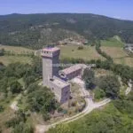 View of castle and tower Passignano sul Trasimeno Umbria Italy