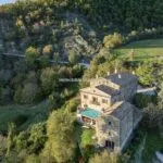 Aerial view of large historic farmhouse Pietralunga Umbria Italy
