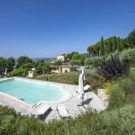 External view of pool and villa Città di Castello Umbria Italy