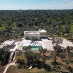 Aerial view of luxury vial and pool for sale Ostunia Apulia Italy