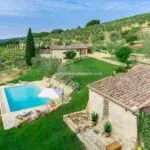 View of farmhouse, pool, land and annexe, Radda in Chianti Tuscany Italy