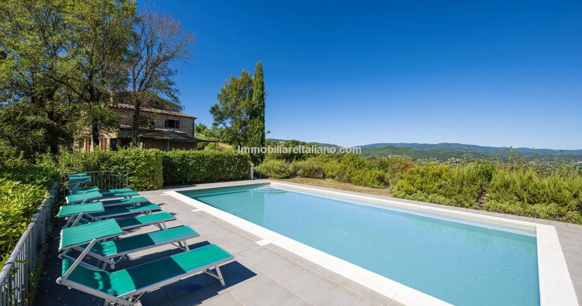 Restored stone Tuscan farmhouse with pool
