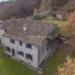 External view of fixer upper property in Tuscany